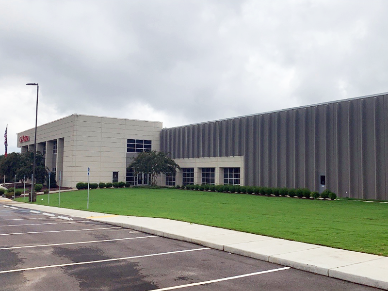Commercial building of Sod Pros Landscaping in Travelers Rest, SC, featuring well-maintained green lawn and modern architecture.